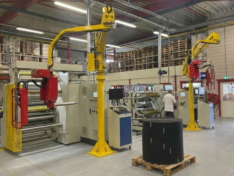 Automated slitting and converting machine